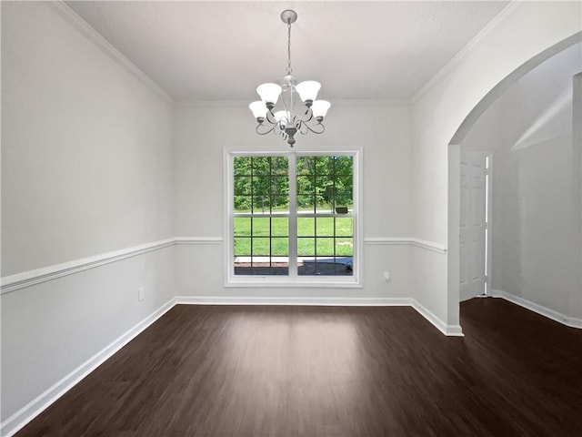 63 Couch Rd, Senoia, GA 30276 - empty room with wood finished floors, a chandelier, arched walkways, baseboards, and crown molding