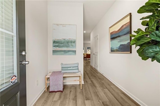 hall featuring light hardwood / wood-style flooring