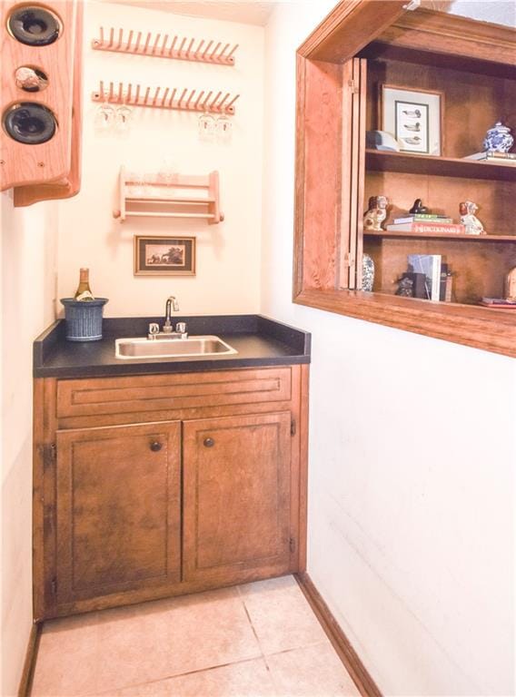 bathroom with vanity and tile patterned flooring