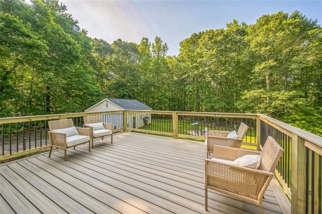 260 Brannon Dr, Hoschton, GA 30548 - wooden deck with an outbuilding