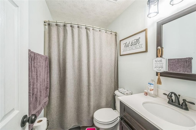 260 Brannon Dr, Hoschton, GA 30548 - bathroom with a textured ceiling, toilet, vanity, and a shower with curtain