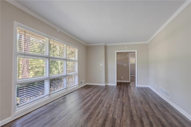 2755 Rockcliff Rd SE, Atlanta, GA 30316 - spare room featuring healthy amount of natural light, dark wood finished floors, crown molding, and baseboards