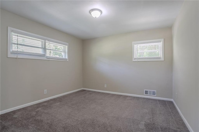 2755 Rockcliff Rd SE, Atlanta, GA 30316 - carpeted spare room with healthy amount of natural light and baseboards