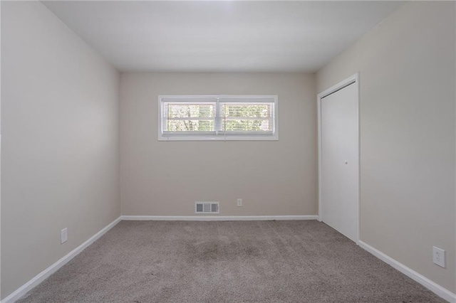 2755 Rockcliff Rd SE, Atlanta, GA 30316 - unfurnished room with carpet floors and baseboards