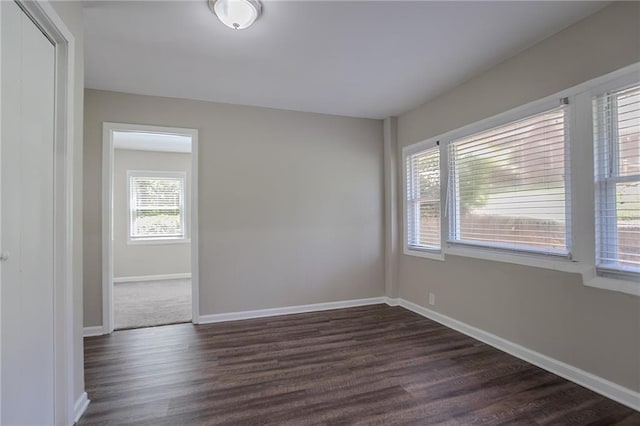 2755 Rockcliff Rd SE, Atlanta, GA 30316 - unfurnished room featuring plenty of natural light, dark wood finished floors, and baseboards