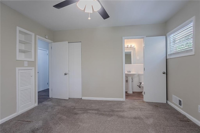 2755 Rockcliff Rd SE, Atlanta, GA 30316 - unfurnished bedroom featuring carpet, ensuite bathroom, a closet, and ceiling fan