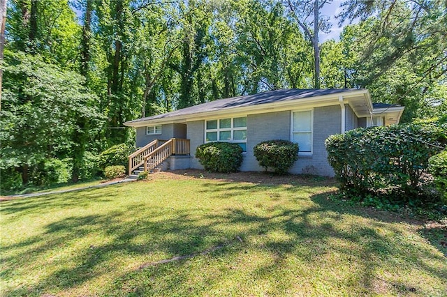 2755 Rockcliff Rd SE, Atlanta, GA 30316 - ranch-style house with brick siding and a front yard
