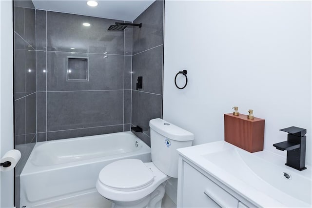 full bathroom featuring washtub / shower combination, recessed lighting, vanity, and toilet