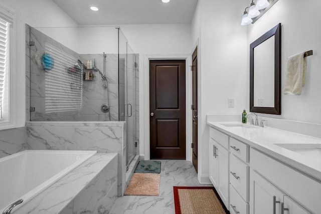 4565 Sims Park Ovlk, Suwanee, GA 30024 - bathroom with marble look tiles, a garden tub, a marble finish shower, double vanity, and recessed lighting