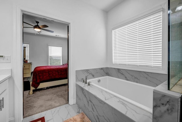 4565 Sims Park Ovlk, Suwanee, GA 30024 - ensuite bathroom with marble finish flooring, a bath, ceiling fan, and vanity