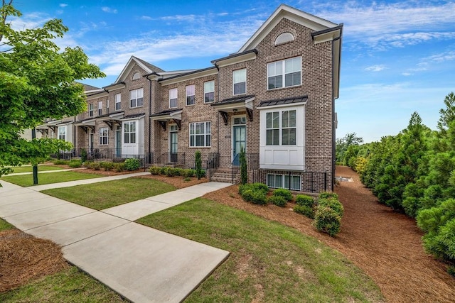 4565 Sims Park Ovlk, Suwanee, GA 30024 - multi unit property featuring brick siding and a front yard
