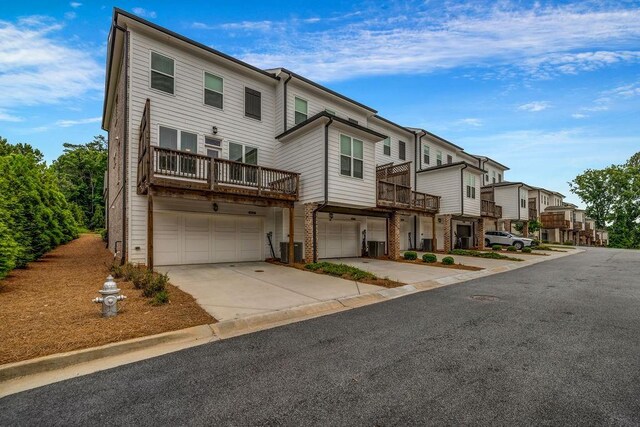 4565 Sims Park Ovlk, Suwanee, GA 30024 - view of asphalt street with a residential view and curbs