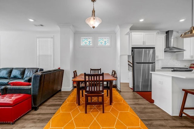 4565 Sims Park Ovlk, Suwanee, GA 30024 - dining room with crown molding, recessed lighting, dark wood-style flooring, and baseboards