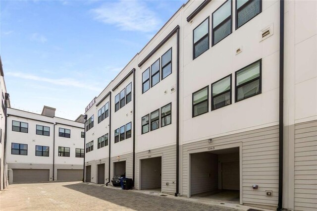 view of building exterior featuring a garage