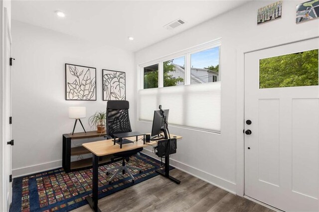 office area featuring recessed lighting, baseboards, visible vents, and wood finished floors