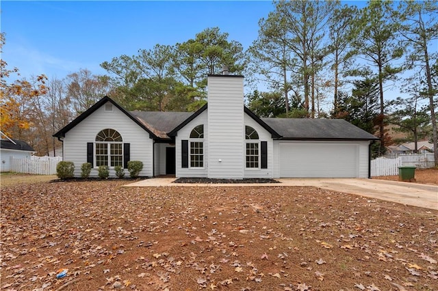 ranch-style house featuring a garage