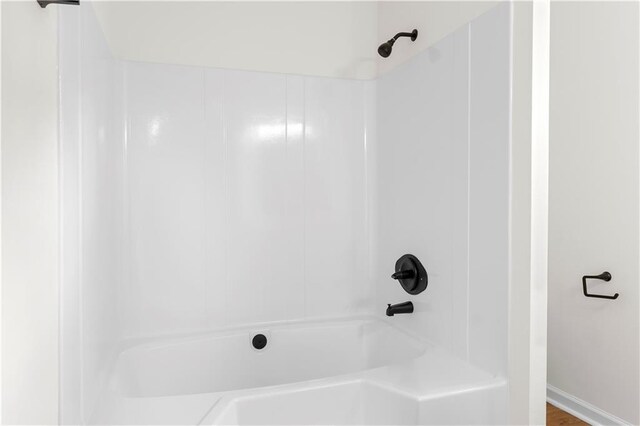 bathroom with shower / bathing tub combination