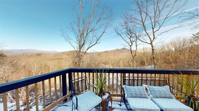 balcony with a deck with mountain view