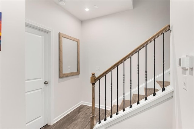 stairway with wood-type flooring