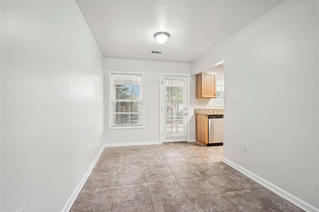 interior space featuring light tile patterned floors