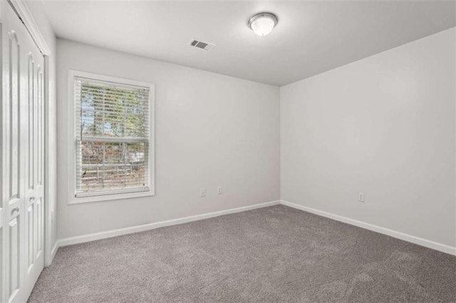 view of carpeted spare room