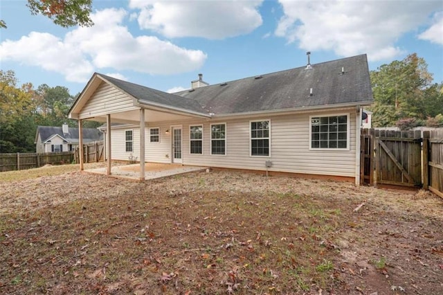 back of property featuring a patio