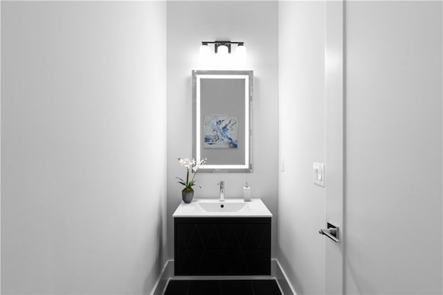 1610 Niskey Lake Rd, Atlanta, GA 30331 - bathroom featuring baseboards and vanity