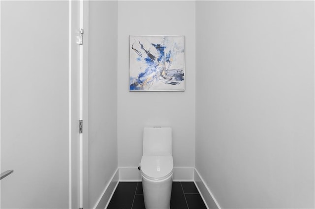 1610 Niskey Lake Rd, Atlanta, GA 30331 - bathroom featuring baseboards, tile patterned floors, and toilet