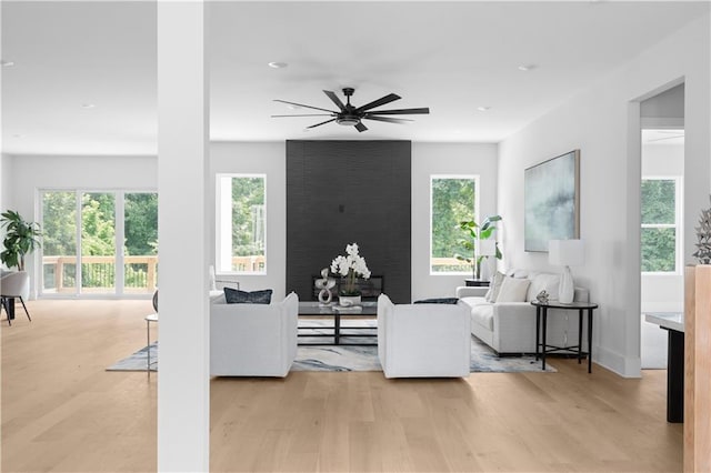 1610 Niskey Lake Rd, Atlanta, GA 30331 - living area featuring light wood-type flooring, a ceiling fan, and baseboards