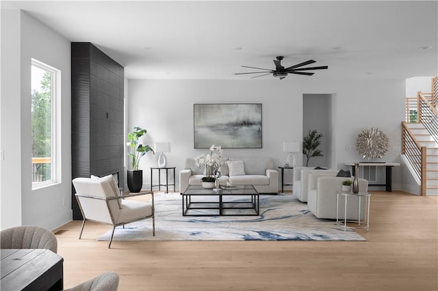 1610 Niskey Lake Rd, Atlanta, GA 30331 - living room with ceiling fan, light wood finished floors, and baseboards