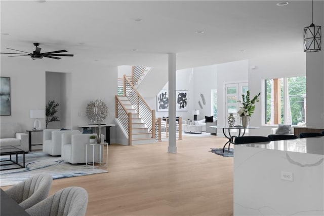 1610 Niskey Lake Rd, Atlanta, GA 30331 - living area featuring stairs, light wood-type flooring, a ceiling fan, and recessed lighting