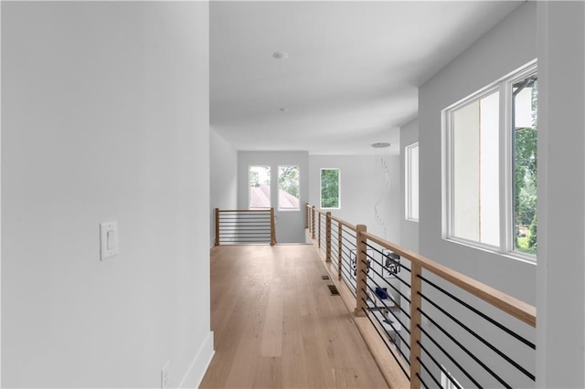 1610 Niskey Lake Rd, Atlanta, GA 30331 - hallway featuring an upstairs landing, light wood-style floors, and baseboards