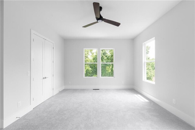 1610 Niskey Lake Rd, Atlanta, GA 30331 - unfurnished bedroom with carpet flooring, baseboards, ceiling fan, and a closet