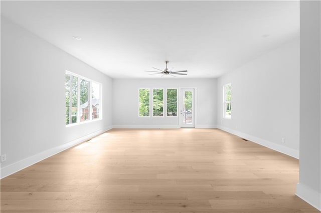 1610 Niskey Lake Rd, Atlanta, GA 30331 - spare room with light wood finished floors, baseboards, and ceiling fan
