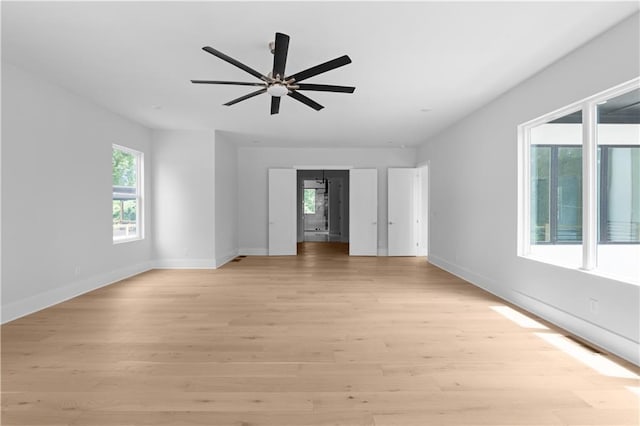 1610 Niskey Lake Rd, Atlanta, GA 30331 - spare room with light wood-style floors, baseboards, and ceiling fan