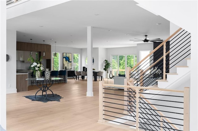 1610 Niskey Lake Rd, Atlanta, GA 30331 - stairway featuring wood finished floors, ceiling fan, and recessed lighting