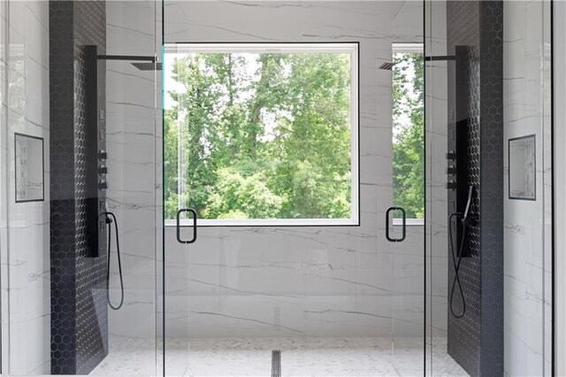 1610 Niskey Lake Rd, Atlanta, GA 30331 - bathroom featuring plenty of natural light and a marble finish shower