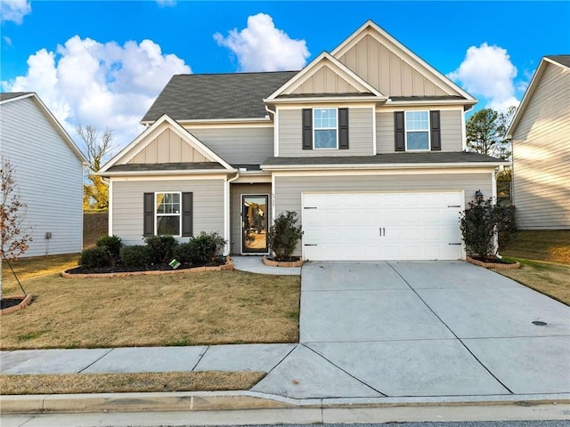 craftsman-style house with a garage and a front lawn