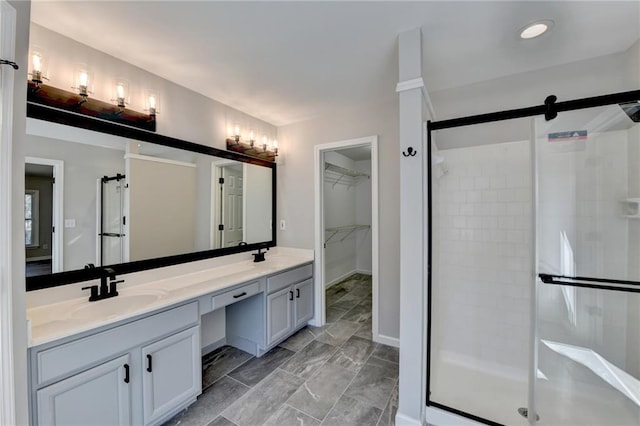 bathroom featuring vanity and walk in shower