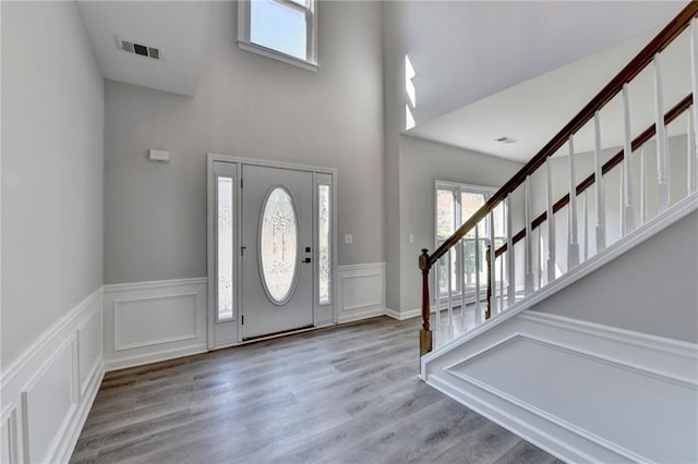 entrance foyer with hardwood / wood-style floors