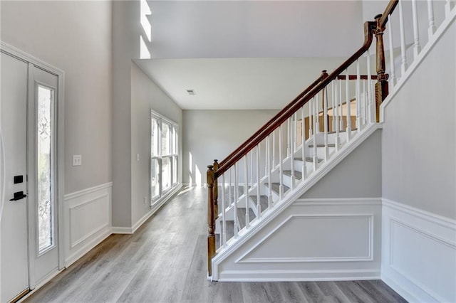 foyer with wood-type flooring