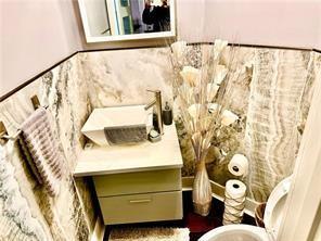 bathroom with sink and toilet