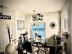 dining room with an inviting chandelier