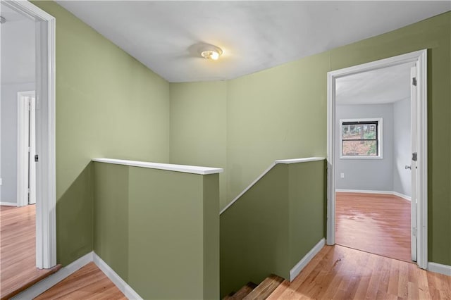 corridor featuring light hardwood / wood-style flooring