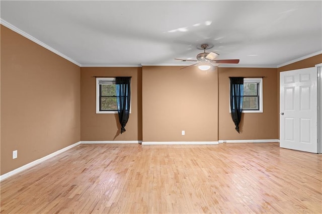 unfurnished room featuring crown molding, plenty of natural light, ceiling fan, and light wood-type flooring