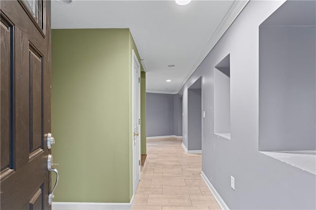 hallway featuring ornamental molding