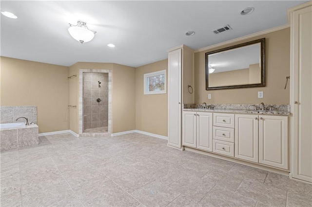 bathroom with vanity and plus walk in shower