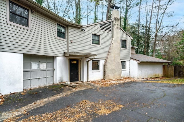 exterior space featuring a garage