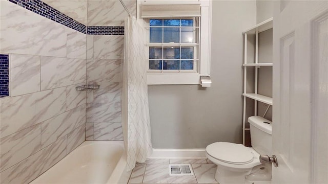 full bath with toilet, baseboards, marble look tiles, and shower / bath combination with curtain