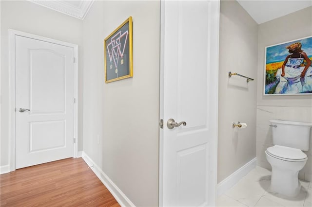 3475 Oak Valley Rd NE Unit 950, Atlanta, GA 30326 - bathroom with toilet, ornamental molding, and baseboards